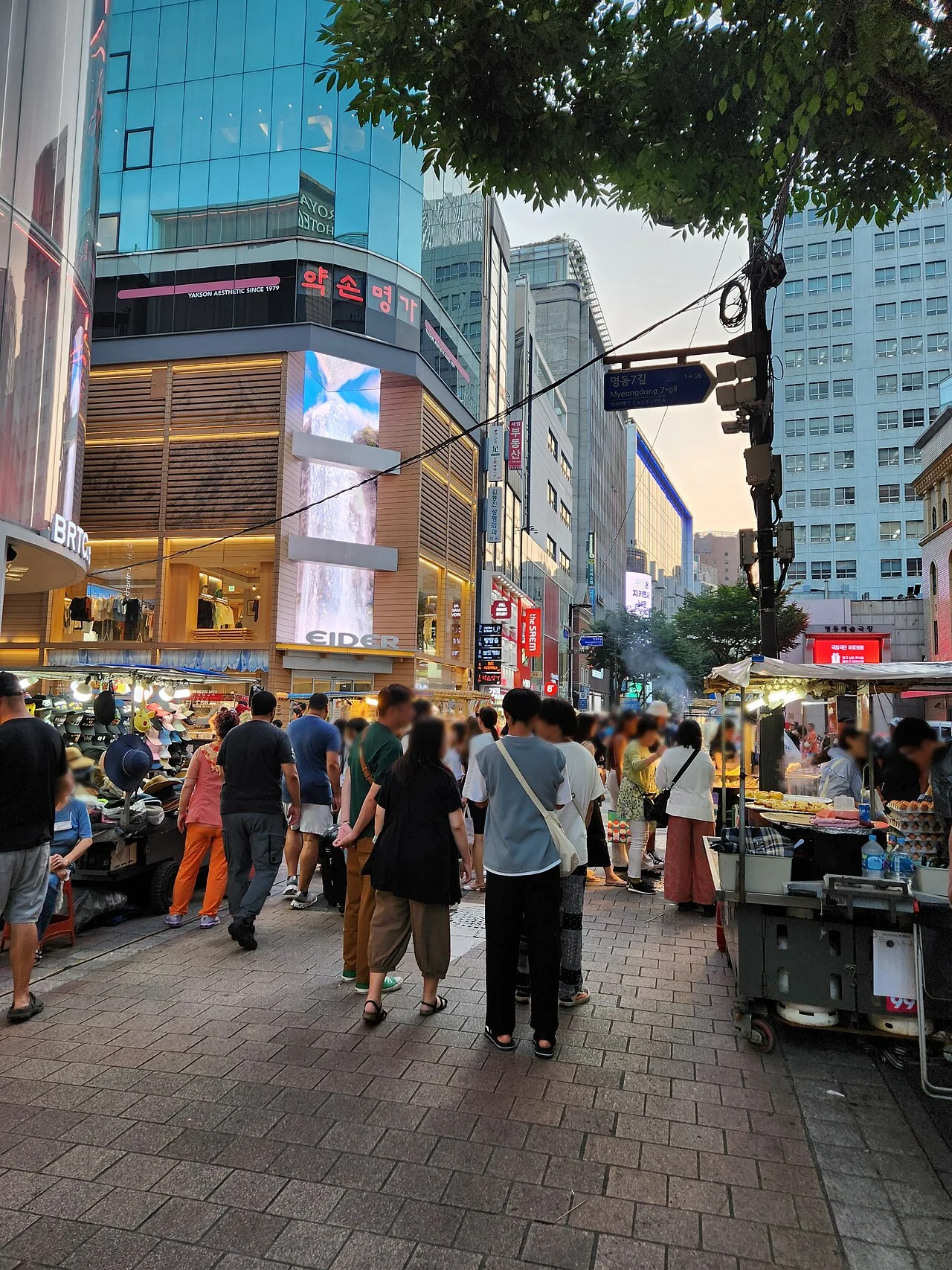 Myeongdong-7gil shopping street in August 2023; an archival neighborhood photograph, not the new MUSINSA store.